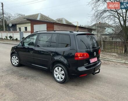 Черный Фольксваген Туран, объемом двигателя 1.4 л и пробегом 207 тыс. км за 10777 $, фото 176 на Automoto.ua