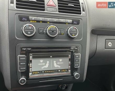 Черный Фольксваген Туран, объемом двигателя 1.4 л и пробегом 207 тыс. км за 10777 $, фото 69 на Automoto.ua