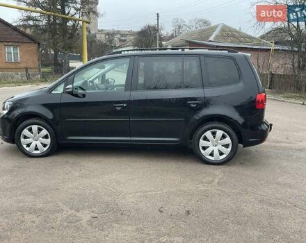 Черный Фольксваген Туран, объемом двигателя 1.4 л и пробегом 207 тыс. км за 10777 $, фото 19 на Automoto.ua