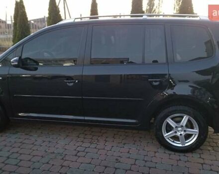 Черный Фольксваген Туран, объемом двигателя 1.6 л и пробегом 165 тыс. км за 13250 $, фото 24 на Automoto.ua