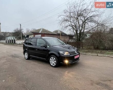 Черный Фольксваген Туран, объемом двигателя 1.4 л и пробегом 207 тыс. км за 10777 $, фото 188 на Automoto.ua