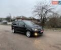 Черный Фольксваген Туран, объемом двигателя 1.4 л и пробегом 207 тыс. км за 10777 $, фото 188 на Automoto.ua