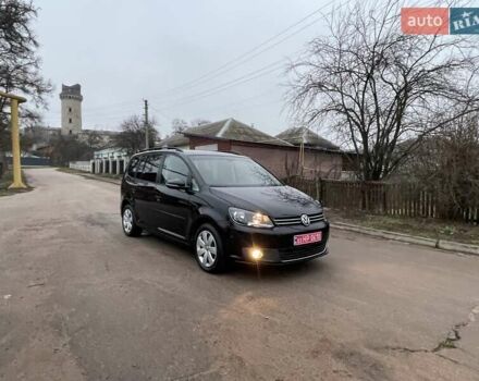Черный Фольксваген Туран, объемом двигателя 1.4 л и пробегом 207 тыс. км за 10777 $, фото 187 на Automoto.ua