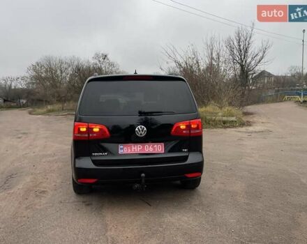 Черный Фольксваген Туран, объемом двигателя 1.4 л и пробегом 207 тыс. км за 10777 $, фото 113 на Automoto.ua