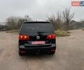 Черный Фольксваген Туран, объемом двигателя 1.4 л и пробегом 207 тыс. км за 10777 $, фото 113 на Automoto.ua
