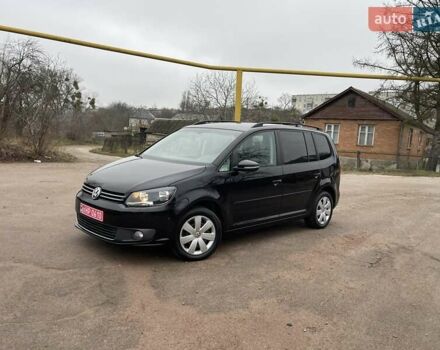 Черный Фольксваген Туран, объемом двигателя 1.4 л и пробегом 207 тыс. км за 10777 $, фото 107 на Automoto.ua