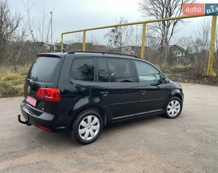 Черный Фольксваген Туран, объемом двигателя 1.4 л и пробегом 207 тыс. км за 10777 $, фото 97 на Automoto.ua