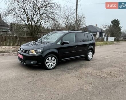 Черный Фольксваген Туран, объемом двигателя 1.4 л и пробегом 207 тыс. км за 10777 $, фото 172 на Automoto.ua