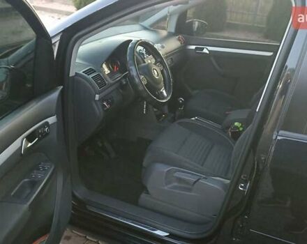 Черный Фольксваген Туран, объемом двигателя 1.6 л и пробегом 165 тыс. км за 13250 $, фото 21 на Automoto.ua