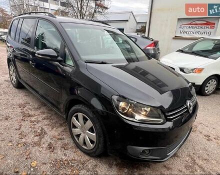 Черный Фольксваген Туран, объемом двигателя 1.4 л и пробегом 207 тыс. км за 10777 $, фото 222 на Automoto.ua