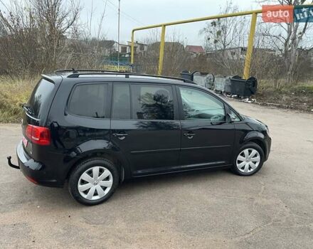 Черный Фольксваген Туран, объемом двигателя 1.4 л и пробегом 207 тыс. км за 10777 $, фото 102 на Automoto.ua