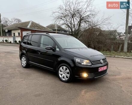 Черный Фольксваген Туран, объемом двигателя 1.4 л и пробегом 207 тыс. км за 10777 $, фото 116 на Automoto.ua