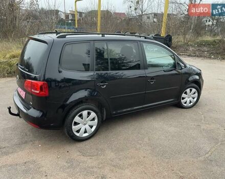 Черный Фольксваген Туран, объемом двигателя 1.4 л и пробегом 207 тыс. км за 10777 $, фото 101 на Automoto.ua