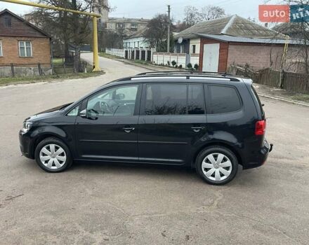 Черный Фольксваген Туран, объемом двигателя 1.4 л и пробегом 207 тыс. км за 10777 $, фото 18 на Automoto.ua