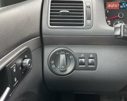 Черный Фольксваген Туран, объемом двигателя 1.4 л и пробегом 207 тыс. км за 10777 $, фото 76 на Automoto.ua