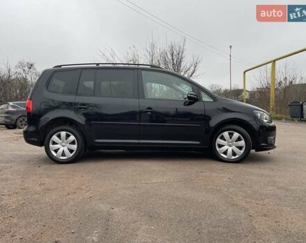 Черный Фольксваген Туран, объемом двигателя 1.4 л и пробегом 207 тыс. км за 10777 $, фото 96 на Automoto.ua