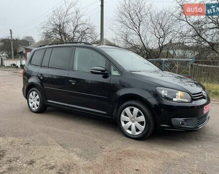 Черный Фольксваген Туран, объемом двигателя 1.4 л и пробегом 207 тыс. км за 10777 $, фото 2 на Automoto.ua