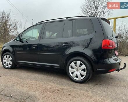 Черный Фольксваген Туран, объемом двигателя 1.4 л и пробегом 207 тыс. км за 10777 $, фото 112 на Automoto.ua