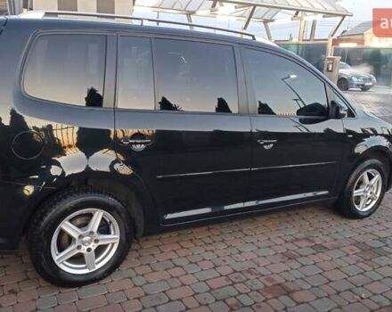 Черный Фольксваген Туран, объемом двигателя 1.6 л и пробегом 165 тыс. км за 13250 $, фото 10 на Automoto.ua