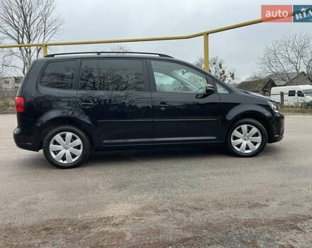 Черный Фольксваген Туран, объемом двигателя 1.4 л и пробегом 207 тыс. км за 10777 $, фото 182 на Automoto.ua