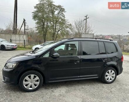 Чорний Фольксваген Туран, об'ємом двигуна 2 л та пробігом 248 тис. км за 13150 $, фото 2 на Automoto.ua