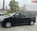 Чорний Фольксваген Туран, об'ємом двигуна 2 л та пробігом 248 тис. км за 13150 $, фото 2 на Automoto.ua