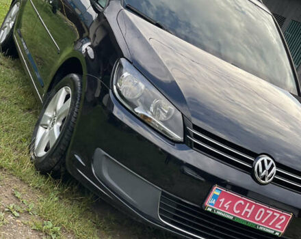 Чорний Фольксваген Туран, об'ємом двигуна 1.6 л та пробігом 253 тис. км за 12700 $, фото 1 на Automoto.ua