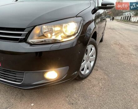 Черный Фольксваген Туран, объемом двигателя 1.4 л и пробегом 207 тыс. км за 10777 $, фото 104 на Automoto.ua