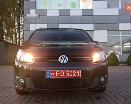 Черный Фольксваген Туран, объемом двигателя 1.6 л и пробегом 165 тыс. км за 13250 $, фото 1 на Automoto.ua