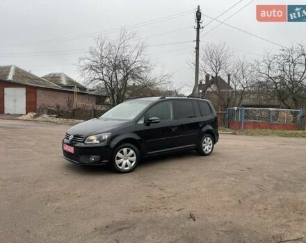 Черный Фольксваген Туран, объемом двигателя 1.4 л и пробегом 207 тыс. км за 10777 $, фото 8 на Automoto.ua