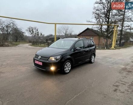 Черный Фольксваген Туран, объемом двигателя 1.4 л и пробегом 207 тыс. км за 10777 $, фото 191 на Automoto.ua