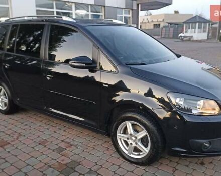 Черный Фольксваген Туран, объемом двигателя 1.6 л и пробегом 165 тыс. км за 13250 $, фото 2 на Automoto.ua