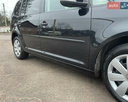 Черный Фольксваген Туран, объемом двигателя 1.4 л и пробегом 207 тыс. км за 10777 $, фото 121 на Automoto.ua