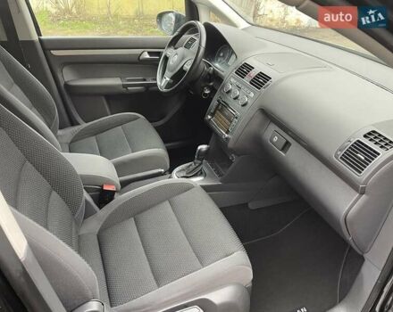 Черный Фольксваген Туран, объемом двигателя 1.4 л и пробегом 207 тыс. км за 10777 $, фото 214 на Automoto.ua