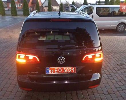 Черный Фольксваген Туран, объемом двигателя 1.6 л и пробегом 165 тыс. км за 13250 $, фото 76 на Automoto.ua