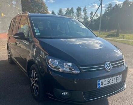 Черный Фольксваген Туран, объемом двигателя 1.6 л и пробегом 295 тыс. км за 12100 $, фото 1 на Automoto.ua