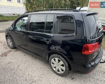 Черный Фольксваген Туран, объемом двигателя 1.4 л и пробегом 207 тыс. км за 10777 $, фото 224 на Automoto.ua