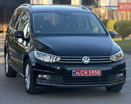Чорний Фольксваген Туран, об'ємом двигуна 2 л та пробігом 239 тис. км за 16250 $, фото 2 на Automoto.ua