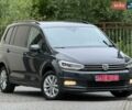 Черный Фольксваген Туран, объемом двигателя 1.97 л и пробегом 225 тыс. км за 16499 $, фото 1 на Automoto.ua