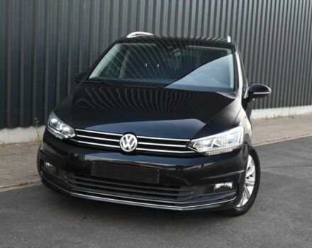 Черный Фольксваген Туран, объемом двигателя 1.8 л и пробегом 53 тыс. км за 16000 $, фото 1 на Automoto.ua