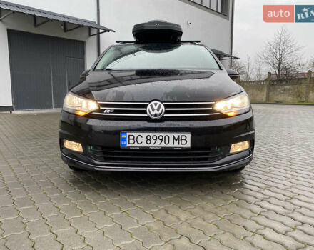 Черный Фольксваген Туран, объемом двигателя 1.97 л и пробегом 242 тыс. км за 14200 $, фото 2 на Automoto.ua