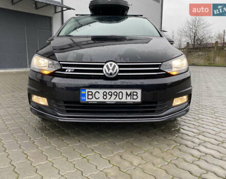 Черный Фольксваген Туран, объемом двигателя 1.97 л и пробегом 242 тыс. км за 14200 $, фото 1 на Automoto.ua