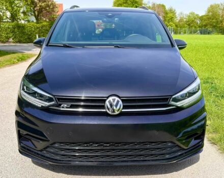 Черный Фольксваген Туран, объемом двигателя 2 л и пробегом 49 тыс. км за 12100 $, фото 1 на Automoto.ua