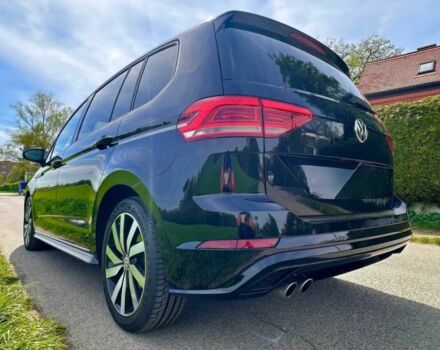 Черный Фольксваген Туран, объемом двигателя 2 л и пробегом 49 тыс. км за 12100 $, фото 3 на Automoto.ua