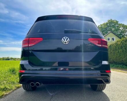 Черный Фольксваген Туран, объемом двигателя 2 л и пробегом 49 тыс. км за 12100 $, фото 4 на Automoto.ua