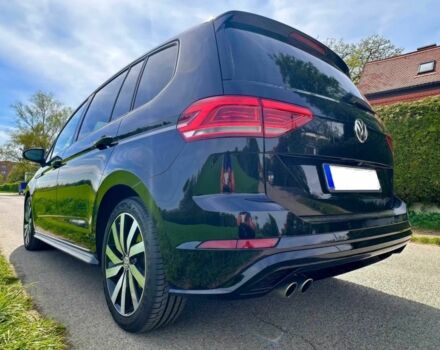 Чорний Фольксваген Туран, об'ємом двигуна 2 л та пробігом 40 тис. км за 8400 $, фото 3 на Automoto.ua