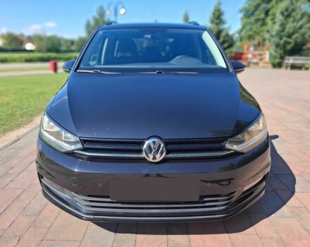 Черный Фольксваген Туран, объемом двигателя 2 л и пробегом 40 тыс. км за 7500 $, фото 1 на Automoto.ua