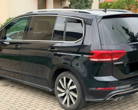 Черный Фольксваген Туран, объемом двигателя 0 л и пробегом 87 тыс. км за 12000 $, фото 2 на Automoto.ua