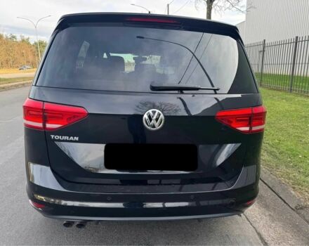 Чорний Фольксваген Туран, об'ємом двигуна 2 л та пробігом 38 тис. км за 12500 $, фото 4 на Automoto.ua