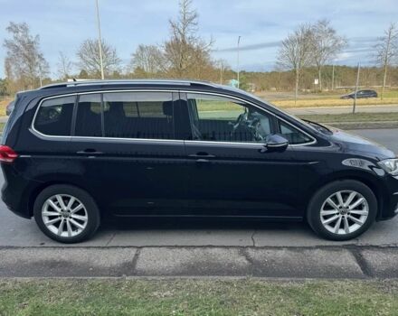 Чорний Фольксваген Туран, об'ємом двигуна 2 л та пробігом 38 тис. км за 12500 $, фото 5 на Automoto.ua